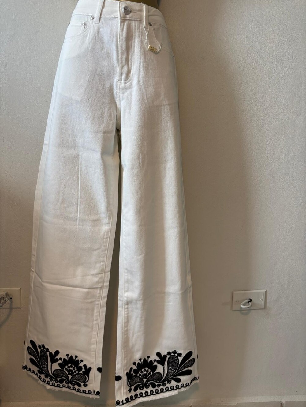 White Wide-Leg Jeans with Black Embroidered Hem